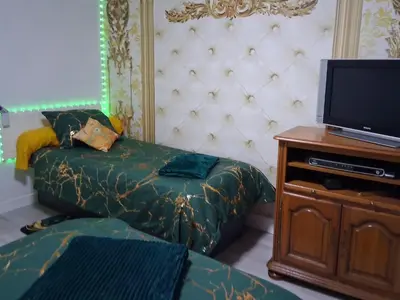 Un ou plusieurs lits dans un hébergement de l'établissement Une Chouette Maison