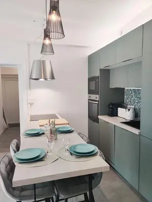 Cuisine ou kitchenette dans l'établissement Da Vinci - Charmant et Relax