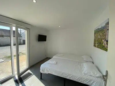 Un ou plusieurs lits dans un hébergement de l'établissement Appartement 8pers à Vallères