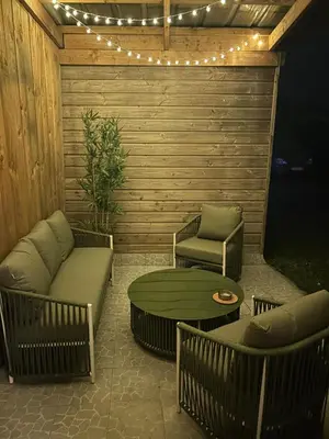 Coin salon dans l'établissement Maison cosy avec terrasse & parking - 5min de Tours