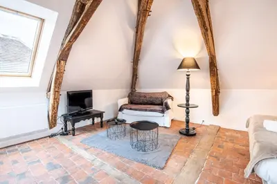 Coin salon dans l'établissement Maison paradisiaque avec piscine