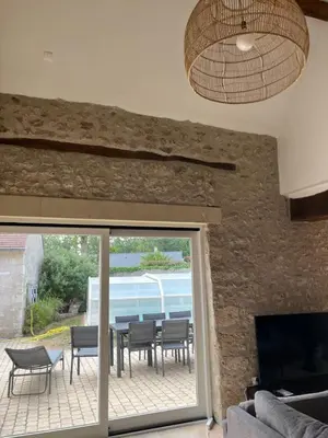 Télévision ou salle de divertissement dans l'établissement La Maison de Zoé