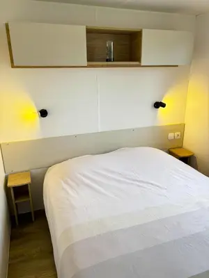Un ou plusieurs lits dans un hébergement de l'établissement Mobilhome dans camping 4 étoiles, entre Châteaux, Beauval et Futuroscope