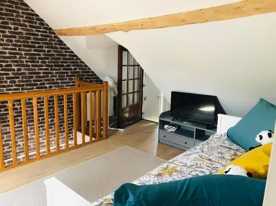 Coin salon dans l'établissement Gîte 