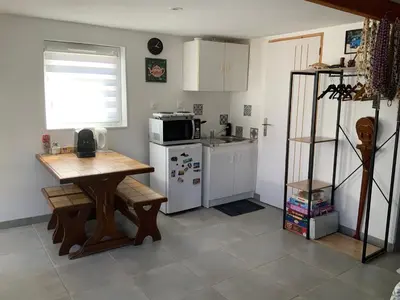 Cuisine ou kitchenette dans l'établissement Maison d’hôtes accès piscine