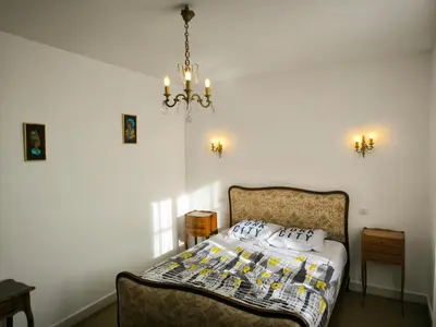 Un ou plusieurs lits dans un hébergement de l'établissement Ambiance château de la Loire