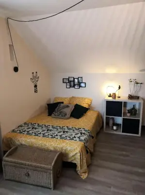 Un ou plusieurs lits dans un hébergement de l'établissement Studio proche zoo de la Flèche