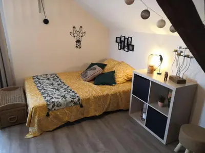 Un ou plusieurs lits dans un hébergement de l'établissement Studio proche zoo de la Flèche