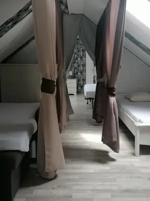 Un ou plusieurs lits dans un hébergement de l'établissement Appartement indépendant, parking privé, 600m du circuit