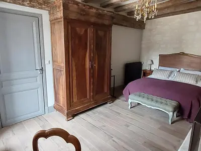 Un ou plusieurs lits dans un hébergement de l'établissement Gîte de charme avec jardin au cœur des châteaux, WiFi, parking inclus - FR-1-381-543