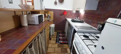 Cuisine ou kitchenette dans l'établissement Gîte Lauréline - Familial et Authentique