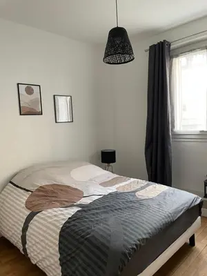Un ou plusieurs lits dans un hébergement de l'établissement Le Cosy