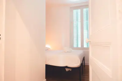 Un ou plusieurs lits dans un hébergement de l'établissement Le Gamay Appartement 6 personnes
