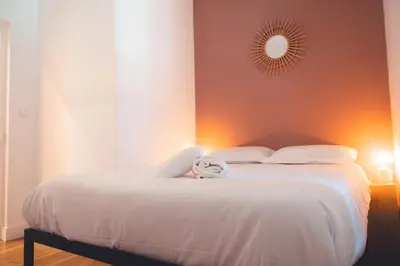 Un ou plusieurs lits dans un hébergement de l'établissement Le Gamay Appartement 6 personnes