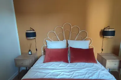 Un ou plusieurs lits dans un hébergement de l'établissement Mini maison au coeur de la Loire