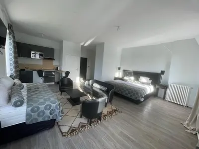 Un ou plusieurs lits dans un hébergement de l'établissement Maison Bardou