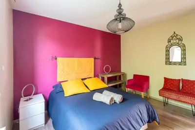 Un ou plusieurs lits dans un hébergement de l'établissement La Villa d'Elvine - Maison avec grand jardin