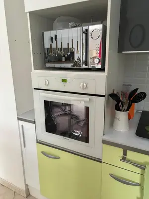 Cuisine ou kitchenette dans l'établissement Maison chaleureuse avec barbecue quartier calme