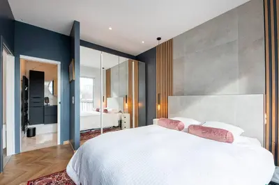 Un ou plusieurs lits dans un hébergement de l'établissement Grammont 5 - Appartement luxueux à Tours