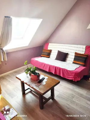 Un ou plusieurs lits dans un hébergement de l'établissement Studio chaleureux à Saint-Barthélemy-d'Anjou de 27 m² + jardin