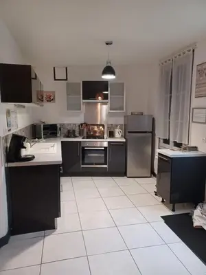 Cuisine ou kitchenette dans l'établissement Le Refuge