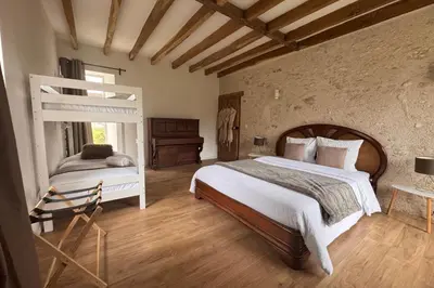 Un ou plusieurs lits dans un hébergement de l'établissement Domaine Le Pineau Private Pool & Nordic Jacuzzi Loire Valley