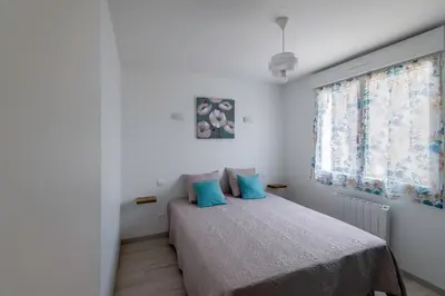 Un ou plusieurs lits dans un hébergement de l'établissement Logis de la Perruche - Maison avec terrasses