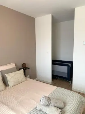 Un ou plusieurs lits dans un hébergement de l'établissement Charmante Villa
