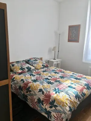 Un ou plusieurs lits dans un hébergement de l'établissement Appartement tempéré avec terrasse