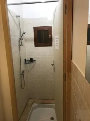 Salle de bains dans l'établissement Le Moulin de Crampaux