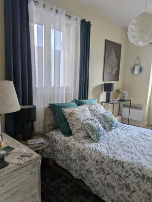Un ou plusieurs lits dans un hébergement de l'établissement Les chambres du vieux quartier