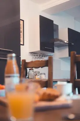 Cuisine ou kitchenette dans l'établissement Le Cube Soma - Confortable T3