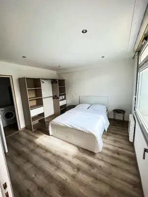 Un ou plusieurs lits dans un hébergement de l'établissement Charmant Appartement au Cœur de Blois