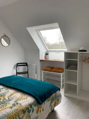 Un ou plusieurs lits dans un hébergement de l'établissement Gîte du Pré Rond