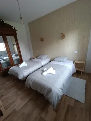 Un ou plusieurs lits dans un hébergement de l'établissement La Petite Maison Dans La Prairie