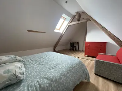 Un ou plusieurs lits dans un hébergement de l'établissement Gîte Le Ballandeau