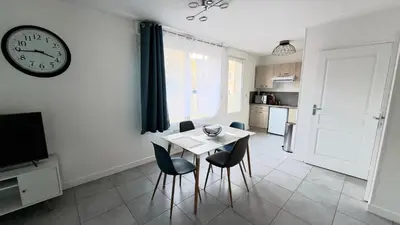 Cuisine ou kitchenette dans l'établissement Appartement Duplex Cosy avec place de parking privée