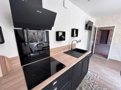 Cuisine ou kitchenette dans l'établissement L'escapade de Chambord