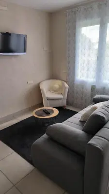 Coin salon dans l'établissement Agréable maison à 5' de Blois