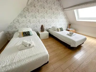 Un ou plusieurs lits dans un hébergement de l'établissement Gites-domainedupin, gîte de la Closerie