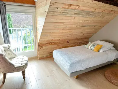 Un ou plusieurs lits dans un hébergement de l'établissement Gites-domainedupin, gîte de la Closerie