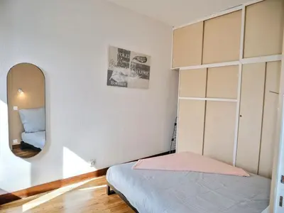 Un ou plusieurs lits dans un hébergement de l'établissement Nicolas en Vienne - Cosy, Confortable, Tout équipé
