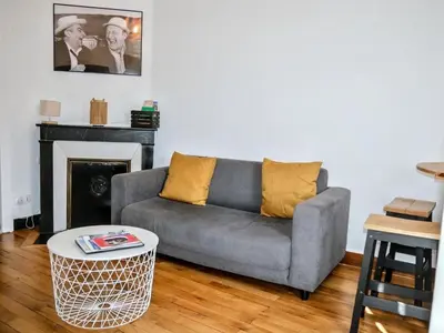 Coin salon dans l'établissement Nicolas en Vienne - Cosy, Confortable, Tout équipé