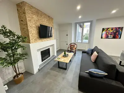 Télévision ou salle de divertissement dans l'établissement Appartement cosy et moderne - 2 Chambres