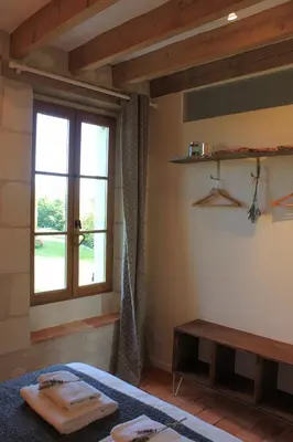 Un ou plusieurs lits dans un hébergement de l'établissement Gîte Moulin d'Olivet