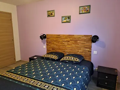 Un ou plusieurs lits dans un hébergement de l'établissement chambre d'hote dans villa avec piscine