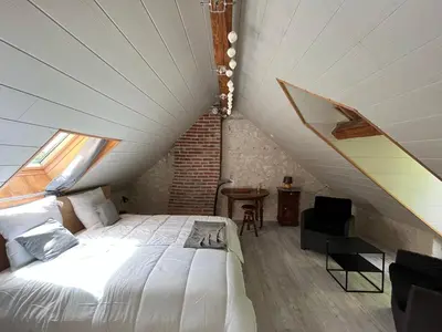 Un ou plusieurs lits dans un hébergement de l'établissement Gîte L'Arche - Maison familiale 7 pers avec jacuzzi privatif entre Blois et Amboise