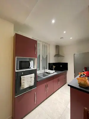 Cuisine ou kitchenette dans l'établissement Au logis du circuit des 24h00
