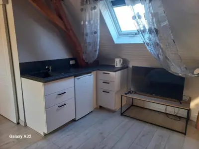 Cuisine ou kitchenette dans l'établissement Le moulin neuf