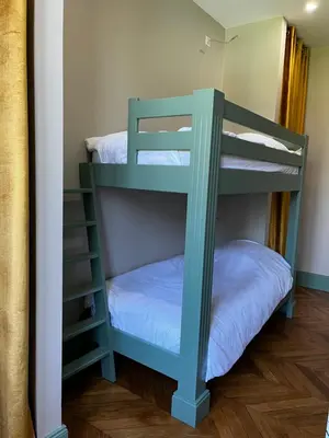 Un ou plusieurs lits dans un hébergement de l'établissement La Parenthèse Fléchoise, Chambre Armand